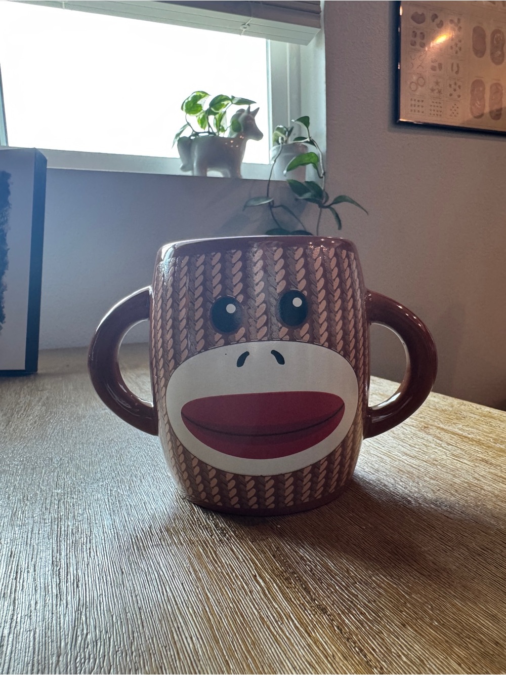 Galerie brown ceramic sock monkey mug featuring two handles - Picture 3 of 4
